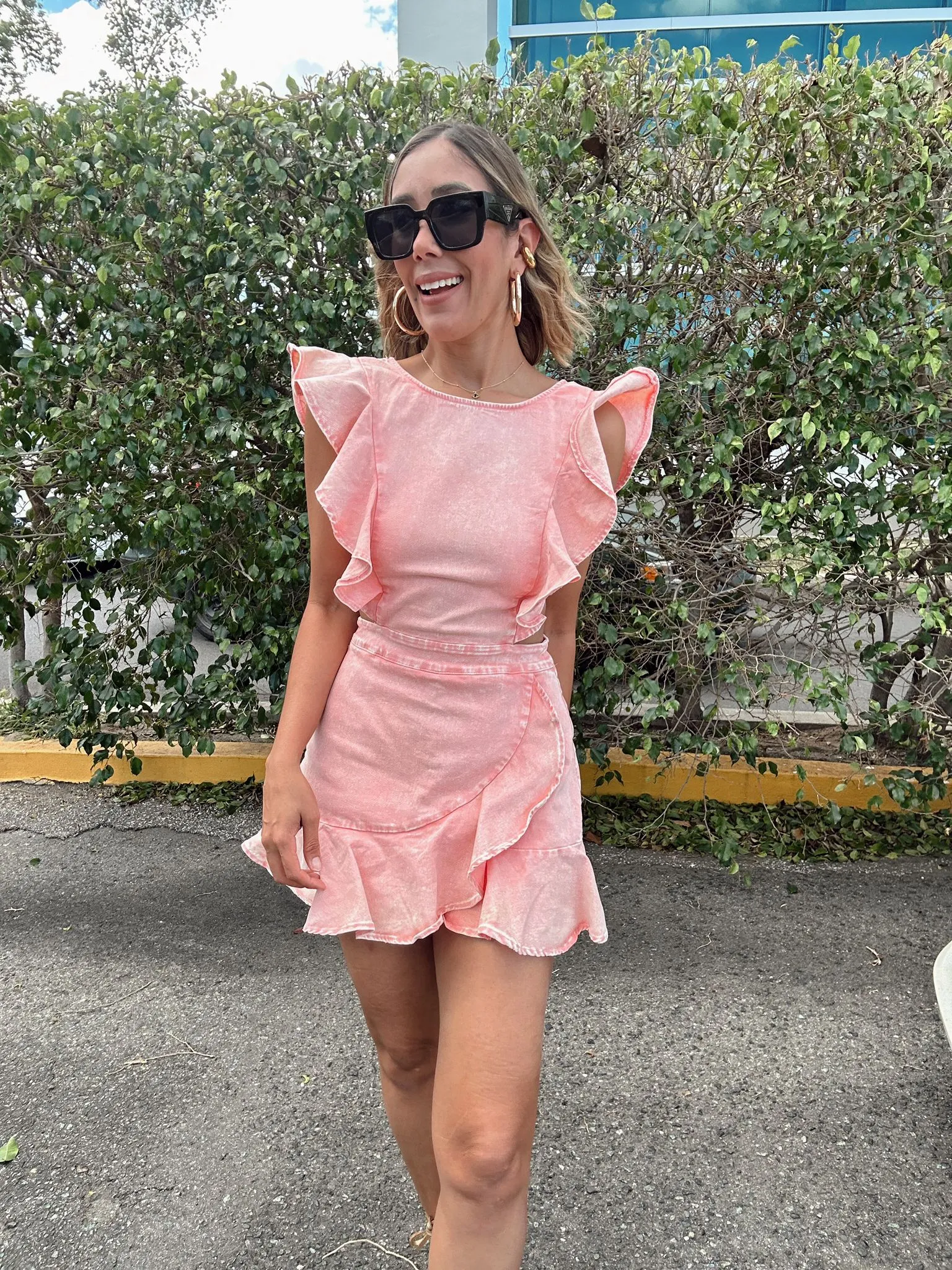 Rosé Ruffle Denim Romper